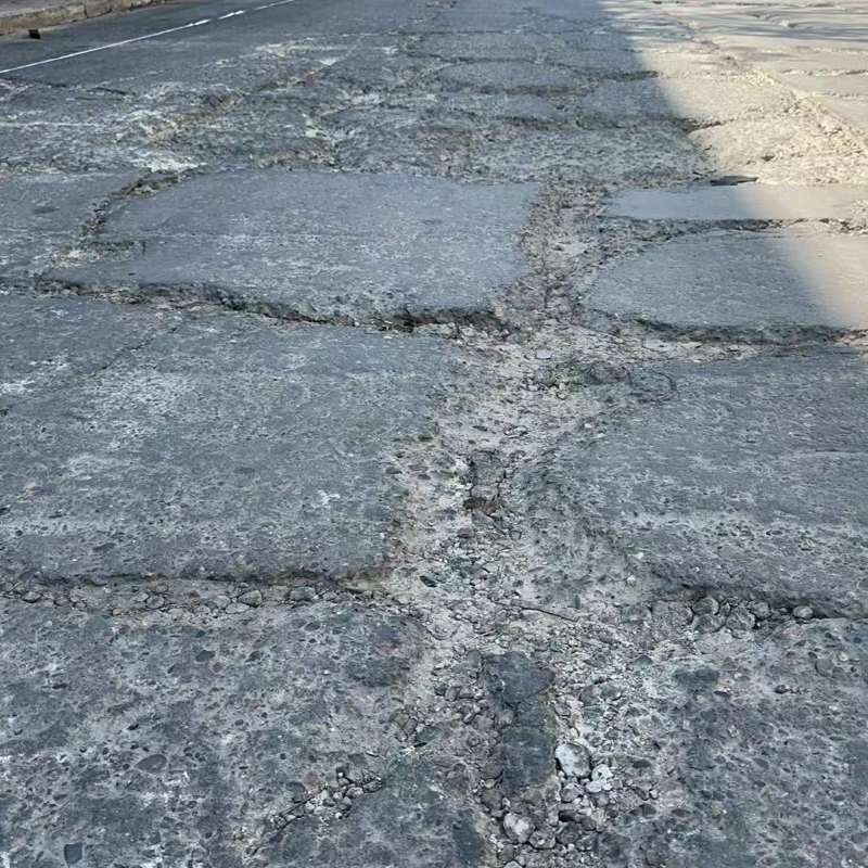 松潘路面起砂露石子修补料